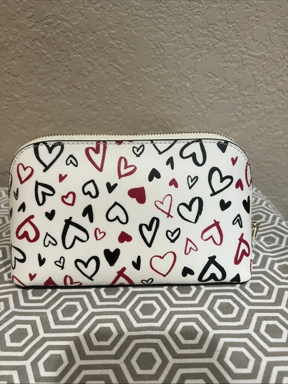 kate spade White Cosmetic Pouch with Red & Black Heart Print